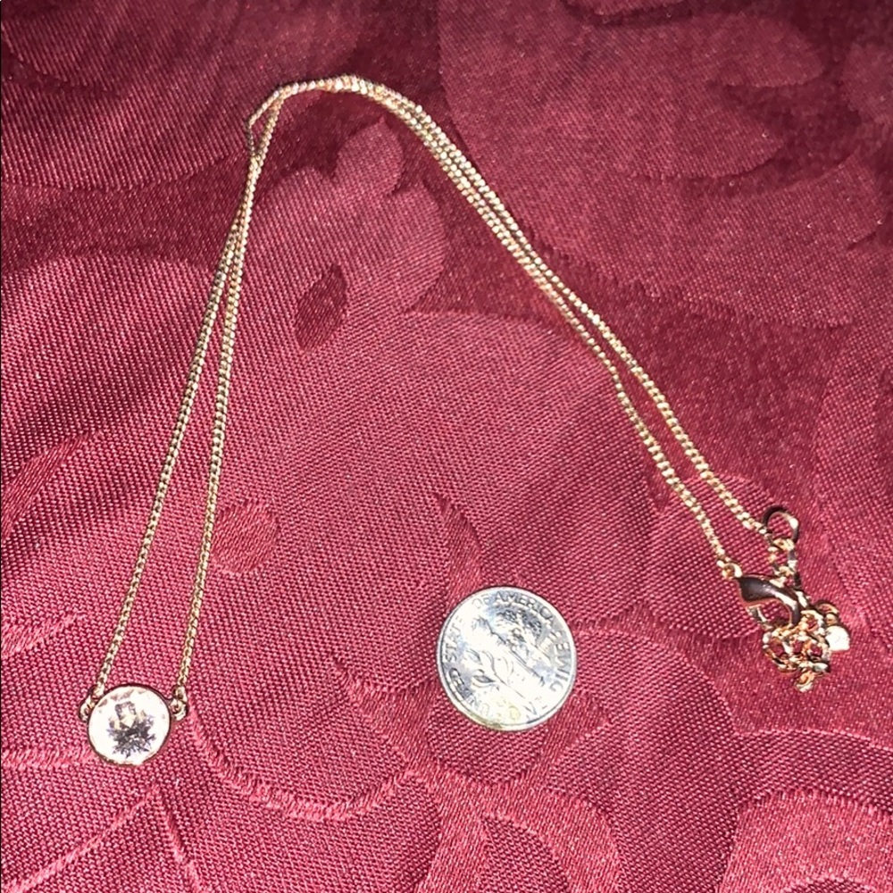 rose gold colored necklace